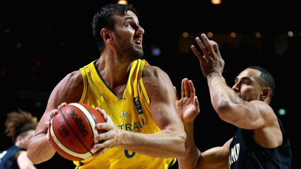 Andrew Bogut of the Boomers drives to the basket.