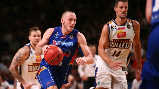 Mitch Creek of the Adelaide 36ers brings the ball forward during the round 16 NBL match.
