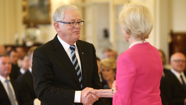 Andrew Robb is sworn in as Trade Minister by former governor-general Quentin Bryce in 2013.