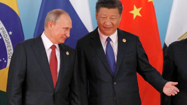 Chinese President Xi Jinping, right, and Russian President Vladimir Putin.