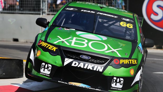 Back in town: Marcos Ambrose tests his new car during practice for the weekend’s season-ending Sydney 500. 