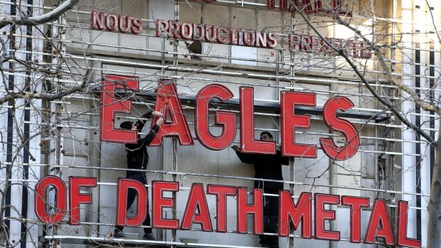 Workers set up ahead a Tuesday's concert by Eagles of Death Metal, at the Olympia music hall, in Paris. Survivors of November's deadly Paris attacks have opened up to a French terrorism commission ahead of a highly charged concert in the French capital.