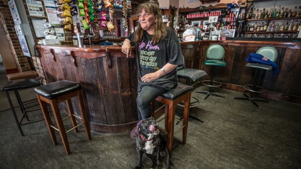 Sharon Kanna, manager of the Footscray Hotel, with Sugar, the pub's official mascot.