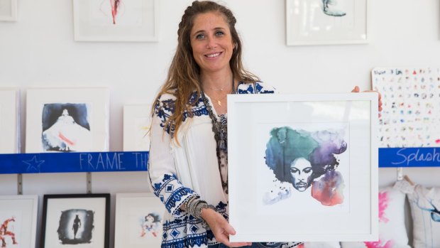 Artist Clementine Campardou with the portrait that Prince bought. 