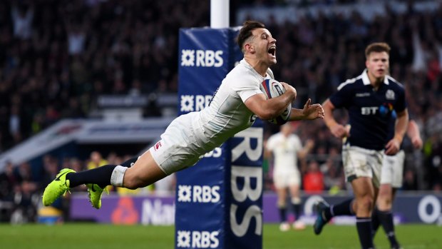 Monster win: Danny Care celebrates one his his two tries for England.