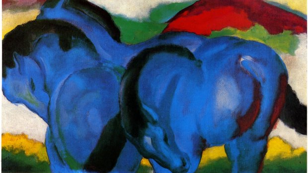 The Large Blue Horses by Franz Marc.
