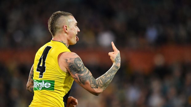 Dustin Martin reacts after kicking a goal.