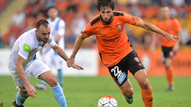 Break away: Thomas Broich of the Roar proves too fast for City's Ivan Franjic.