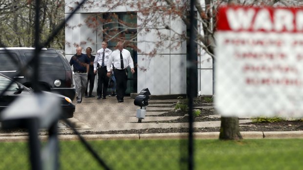 Police officers at Prince's Paisley Park complex after the musician's death.