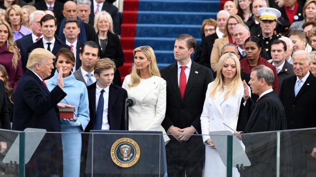 Donald Trump's closest friend, Thomas Barrack jnr, pictured back left with blue scarf at the presidential inauguration, tells Trump when he is wrong.