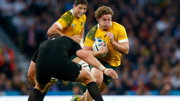 On the attack: Michael Hooper takes on the New Zealand defence during the 2015 Rugby World Cup Final at Twickenham.
