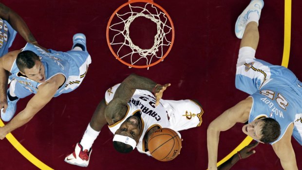 Bird's eye view: LeBron James goes to the basket against the Nuggets.