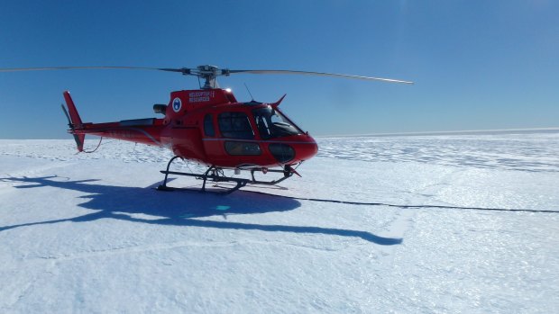 In this photograph of the fuel cache site on December 8, 2015, a glaciologist at the inquest identified a right-angled crevasse in front of the helicopter.