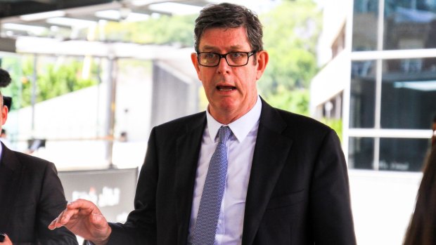 Witness and former Brisbane Grammar School student BQK's solicitor, Peter Skinner, speaks to media outside the Brisbane Magistrates Court.