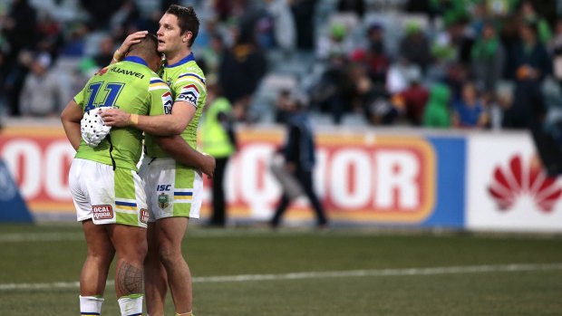 Canberra Raiders captain  Jarrod Croker consoles Josh Papalii after the Cowboys loss. 