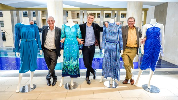 (L-R) Mary Lipshut's son Peter Lipshut, grandson Mark and son Alan Lipshut with some of Mary's outfits.