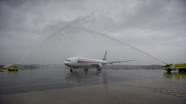 Water cannons greeted the first Singapore Airlines flight.