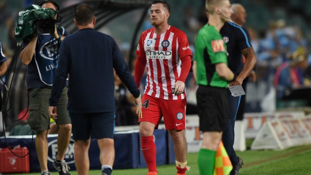 Fearing the worst: Ross McCormack hobbles to the bench after sustaining a knee injury in the 3-1 loss to Sydney.