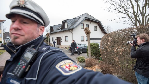 Police outside the home of the parents of Andreas Lubitz.