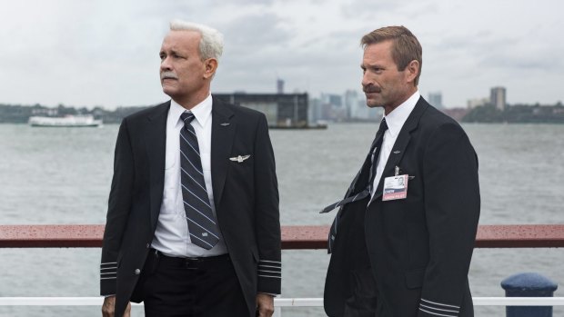 Tom Hanks as Chesley Sullenberger and Aaron Eckhart as Jeff Skiles in <i>Sully</i>, a film about the US Airways pilot who landed his airliner in New York's Hudson River after its engines had suffered bird strike.