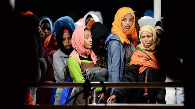 Desperates from North Africa are flooding across the Mediterranean; many rescued en route to Europe, like these migrants arriving in Sicily on Sunday. 