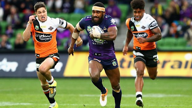 Marika Koroibete of the Storm streaks away against Wests Tigers.