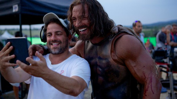 Film director Brett Ratner, pictured with Dwayne Johnson on the set of 2014's Hercules, has been accused of sexual harassment by six women.
