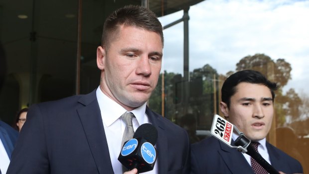 Tough times: Former Sydney Roosters player Shaun Kenny-Dowall leaves Downing Centre Court after pleading guilty of drug possession.