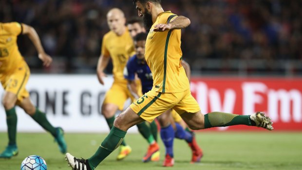 Mile Jedinak scores Australia's first goal during the 2018 FIFA World Cup Qualifier match.