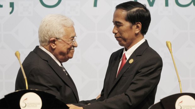Indonesian President Joko Widodo, right, shakes hands with Palestinian Authority President Mahmoud Abbas at an extraordinary summit of Muslim countries on Palestine and the status of Jerusalem in Jakarta in March.