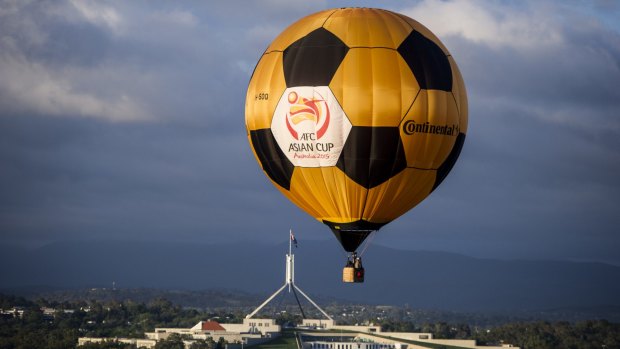 The Asian Cup hot air balloon flying over Canberra on Thursday morning.