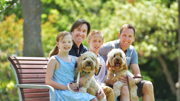 Same-sex family symbols: Lee Matthews, left rear, and partner Tony Wood with their children,  Luci, 10, and Alexander, 12, and dogs Abi and Max.