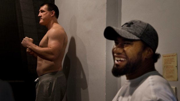 Fighting fit: Sharks captain Paul Gallen and Canberra's Junior Paulo after their weigh in for a charity boxing match.