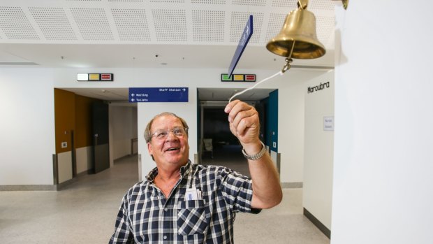 Survivor: Tommy Raudonikis rings the bell of the Nelune cancer centre at the Prince of Wales hospital.