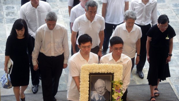 PM Lee Hsien Loong, centre, with siblings Lee Hsien Yang, second from left, and Lee Wei Ling, far right, at their father Lee Kuan Yew's state funeral in 2015.
