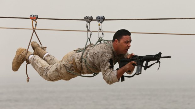 A Lebanese commando demonstrates his skills during an exhibition at the Security Middle East Shows in Beirut this month. Saudi Arabia has pledged billions of dollars in assistance to Lebanon's military and intelligence services. 