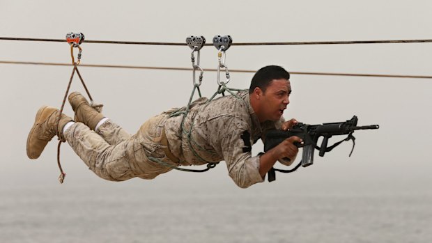 A Lebanese commando demonstrates his skills during an exhibition at the Security Middle East Shows in Beirut this month. Saudi Arabia has pledged billions of dollars in assistance to Lebanon's military and intelligence services. 