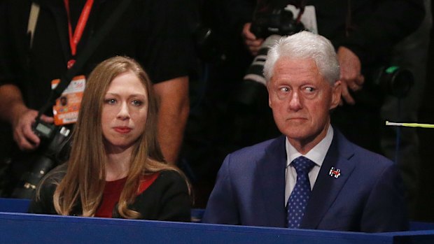 Former President Bill Clinton, with daughter Chelsea, looked uneasy throughout the debate.