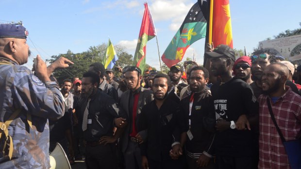 Student protesters in Papua New Guinea in a stand off with police.