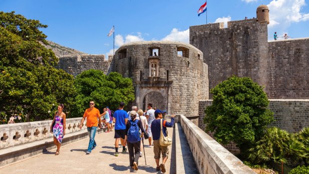 Tourists near at the Pile Gate in Dubrovnik, Croatia. 