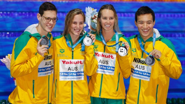 Top four: Mitchell Larkin, Bronte Campbell, Emma McKeon and Daniel Cave show off their silver medals.