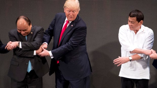 The moment US President Donald Trump realised he was doing the handshake incorrectly. 
