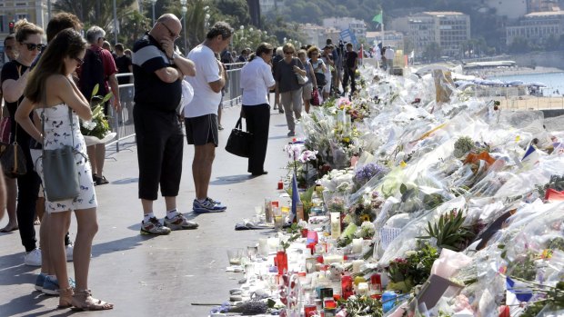 Flowers and messages placed along the beach of the Promenade des Anglais in Nice after the Bastille Day truck attack. 