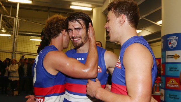 Bulldogs Mitch Wallis, Easton Wood and Jack Macrae after their team's big win on Saturday.