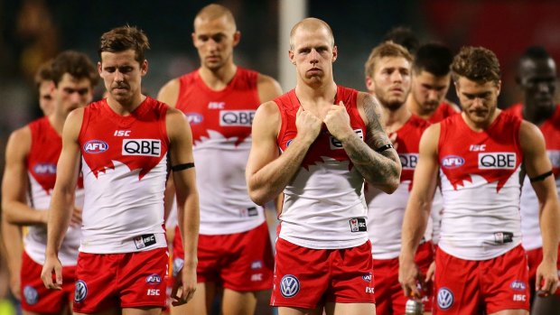 Dejected Swans leave Domain Stadium after their fourth straight loss. 
