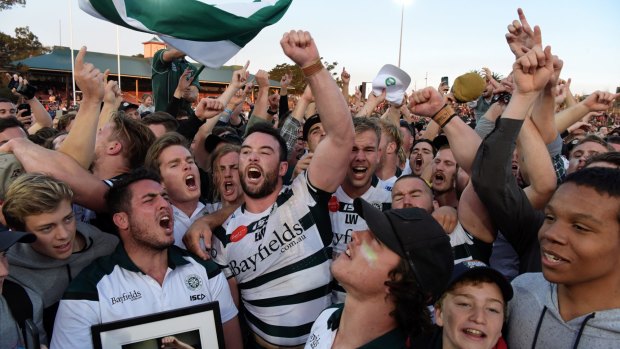 Alive and well: Warringah players and fans celebrate their Shute Shield success.