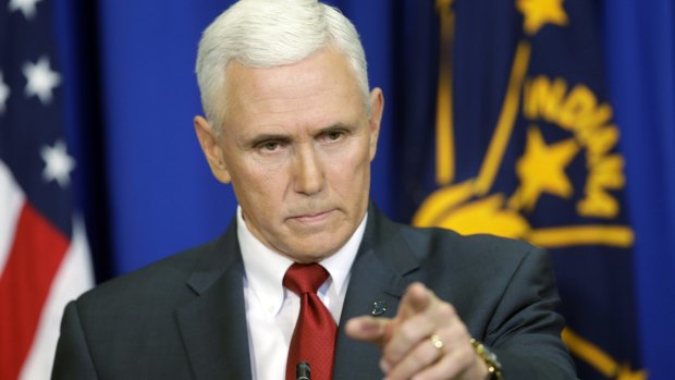 Indiana governor Mike Pence answers questions about his 'religious freedom' law on Tuesday. 