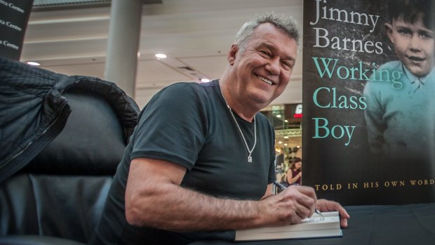 Rock legend Jimmy Barnes signs copies of his autobiography <i>Working Class Boy</i>. 