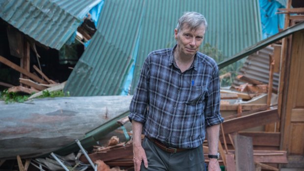 Jack Rhynsburger with the gum tree that killed his neighbour and destroyed his Millgrove home.