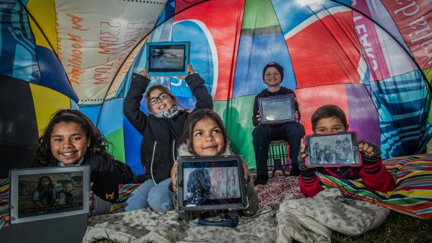 Young filmmakers from the Illawarra region in their pop-up cubby on the lawns of Parliament house to present their film. Warrawong area kids (from left) Nicole Brown, 12, Nyetarlee Jackson, 8, Vicky Thomas, 8, Cooper Magarelli,10 and Drew Brown, 9.